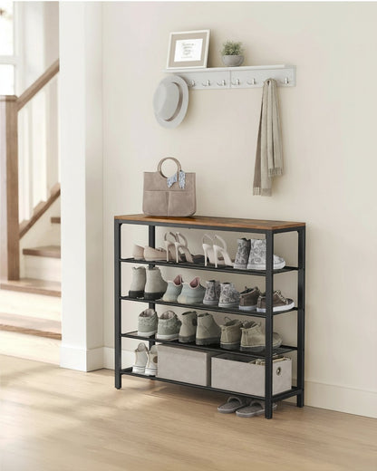 Tokari schoenenrek met vier metalen roosterplanken en een vintage bruine houtlook bovenplaat in een lichte hal.
