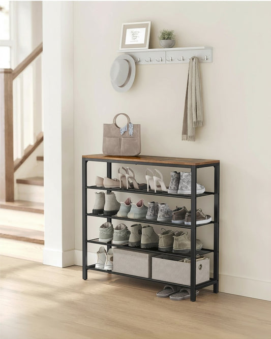 Tokari schoenenrek met vier metalen roosterplanken en een vintage bruine houtlook bovenplaat in een lichte hal.
